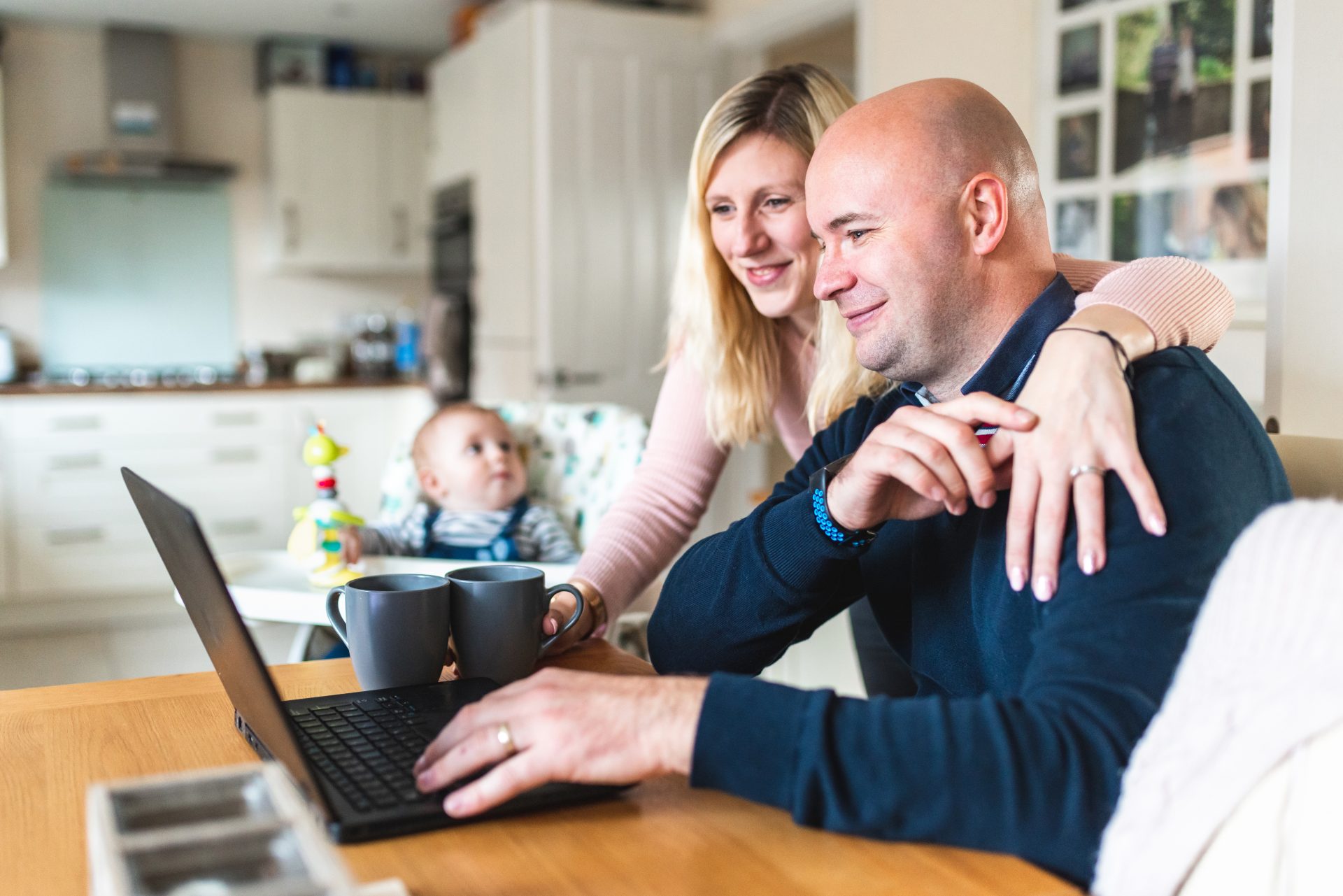 Family laptop kitchen